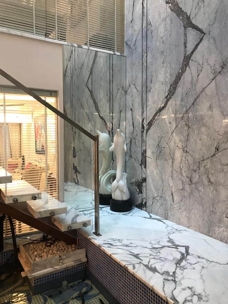 Craftsman polishing marble surface